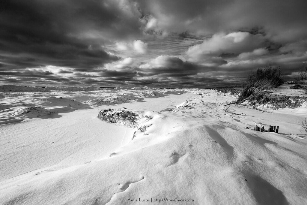 A black and white emptiness of snow and clouds