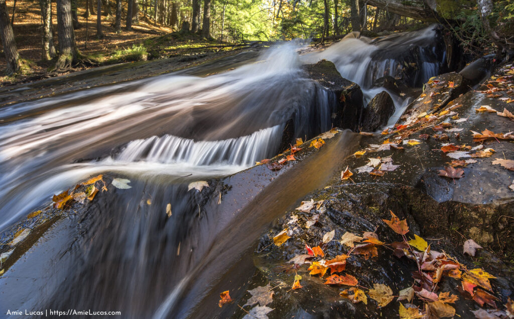 Cascading waterfall in autumn
